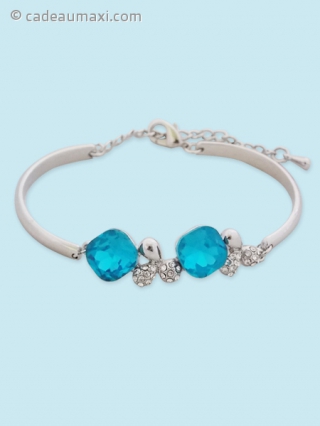 Bracelet argenté à pierres turquoise et trèfles à strass