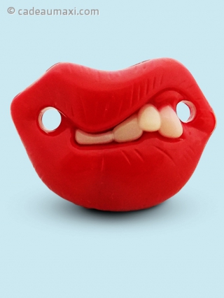 Tétine en forme de sucette drôle avec dents et anneau