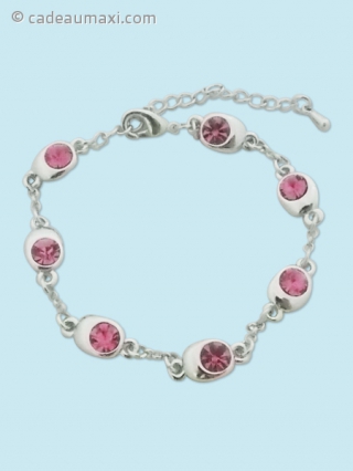 Bracelet argenté à mailles et fausses pierres roses