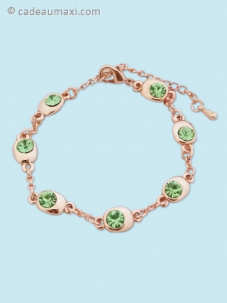Bracelet doré avec fausses pierres vertes